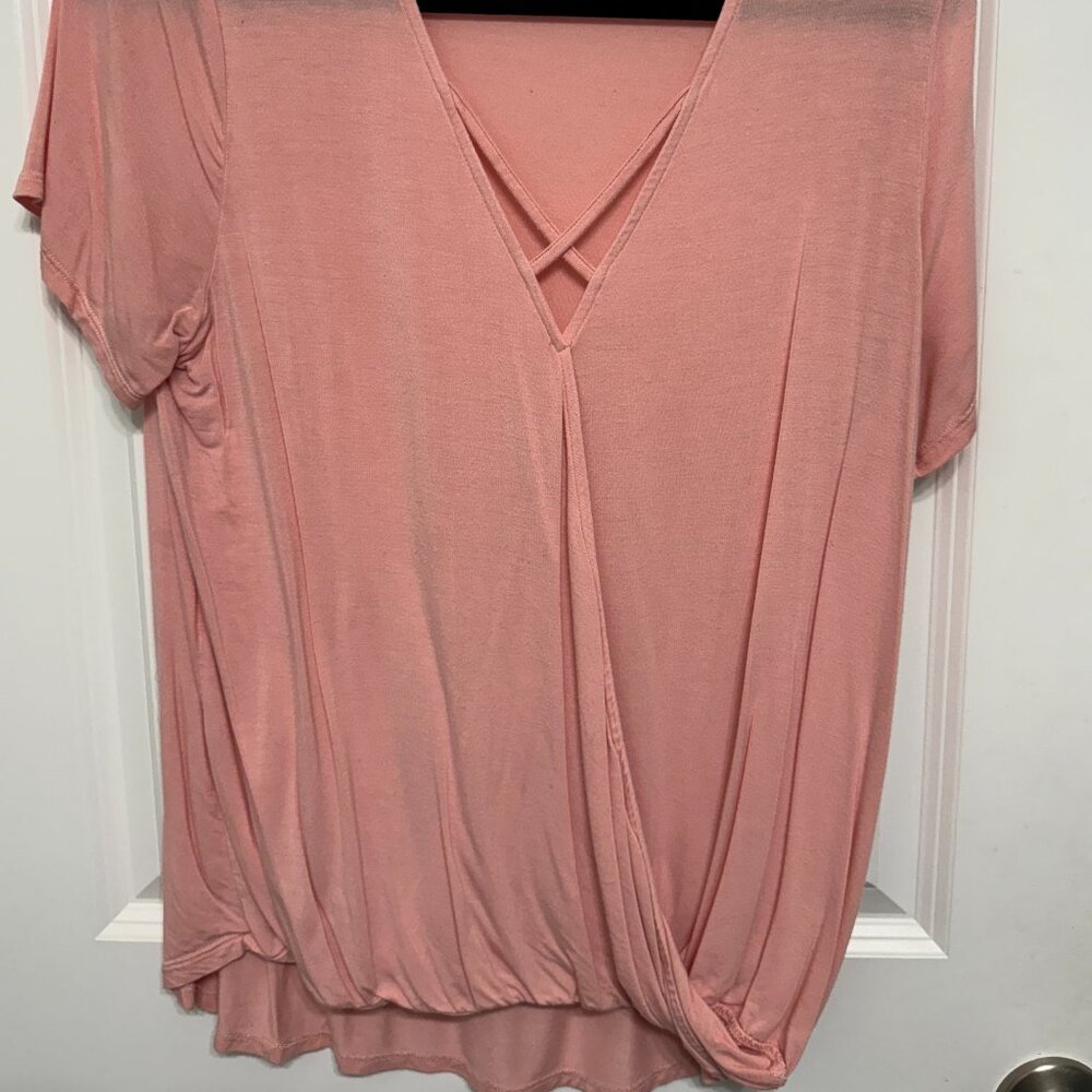 Fun flirty waist line and cross neck line